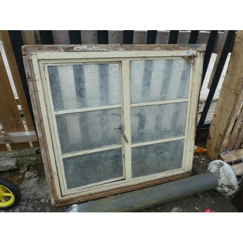 455 - A large vintage wood framed window. (Measuring 115x110cm)