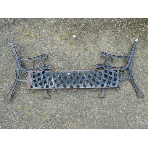 458 - A pair of cast iron garden bench ends & back panel.