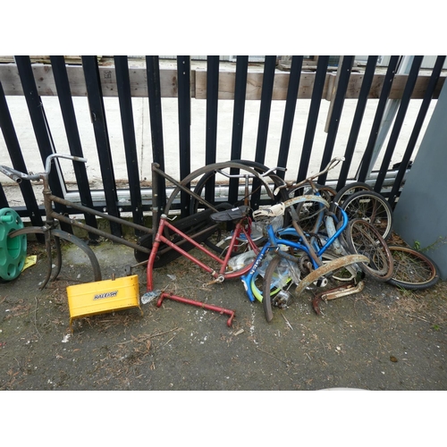 470 - A large assortment of childrens bicycle spare parts etc.