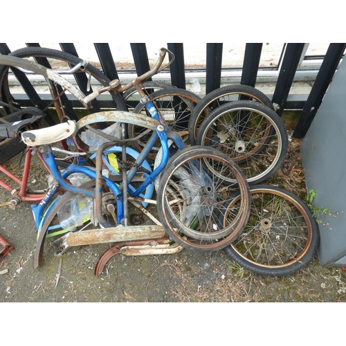 470 - A large assortment of childrens bicycle spare parts etc.