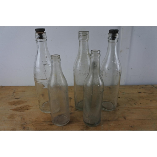 355 - A collection of 5 vintage/ antique glass bottles.