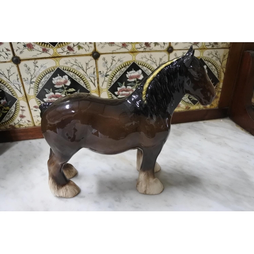 369 - A Royal Doulton horse figure in original card box.