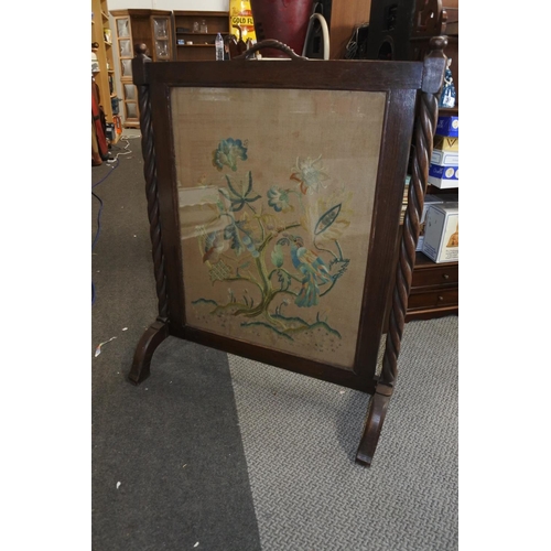 374 - An antique tapestry fire screen.