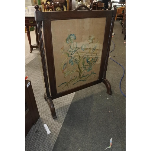 374 - An antique tapestry fire screen.