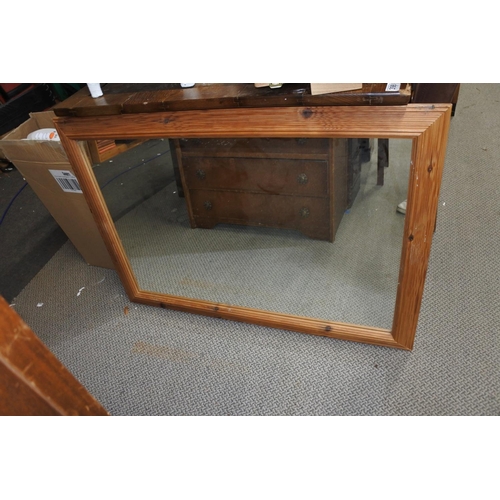 397 - A large pine framed mirror. (Measuring 103x75cm)