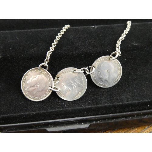 506 - A silver 3 pence necklace.