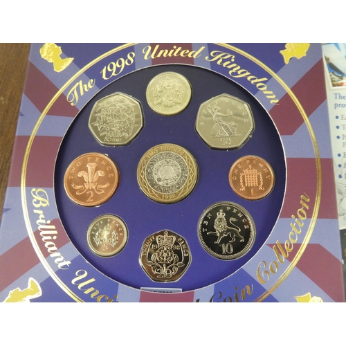 519 - A 1998 uncirculated coin set, along with commemorative crown coin.