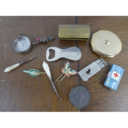 522 - A collection of various items to include vintage bottle opener, cigar cutters & more.
