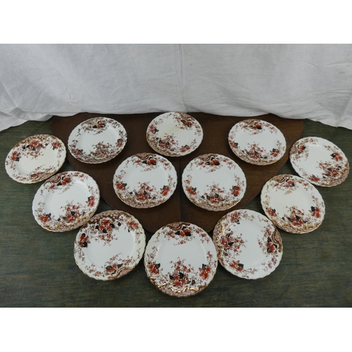 526 - A set of 12 decorative antique side plates.