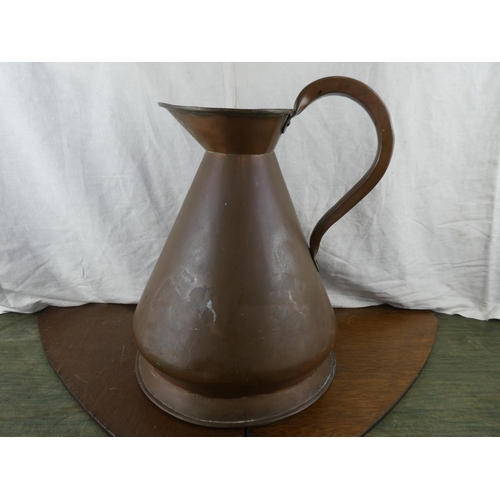 529 - A stunning antique 2 gallon copper measure jug.
