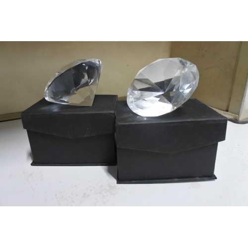 545 - 2 decorative paper weights, modelled as diamonds.