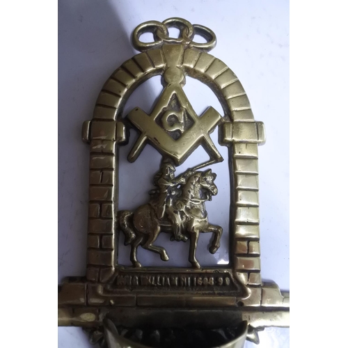 546 - An unusual brass wall plaque showing King William on horse.