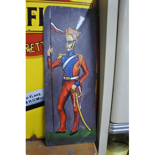 565 - A stunning hand painted soldier on slate, signed to rear 'A Jennings 1985'.