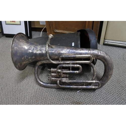 567 - A stunning antique silver plated Tuba in case, produced by Butler.