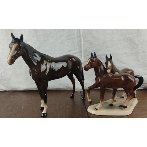 373 - A stunning Beswick ceramic horse and a Kirtwig horse and foal.
