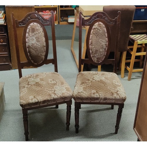 395 - A pair of antique dining chairs.