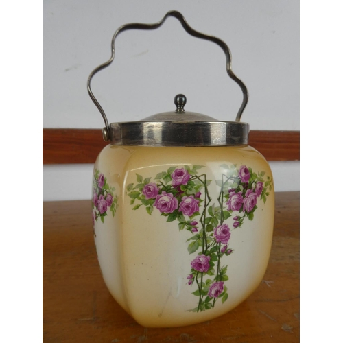 12 - An antique lidded silver plated biscuit barrel.