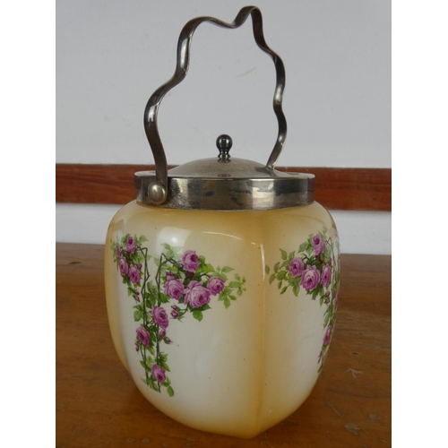 12 - An antique lidded silver plated biscuit barrel.