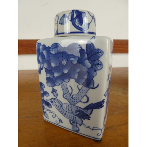 26 - An Oriental blue lidded tea caddy/ flask.
