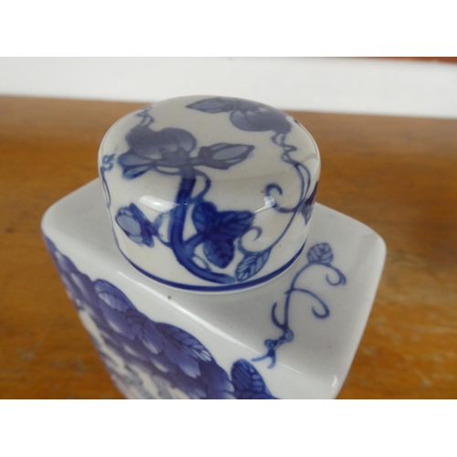 26 - An Oriental blue lidded tea caddy/ flask.