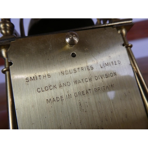 36 - An antique brass Smiths mantle clock.