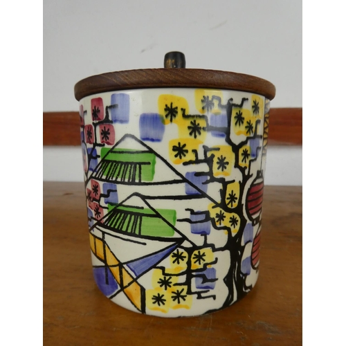 42 - A vintage ceramic Swedish tea caddy with wooden lid.