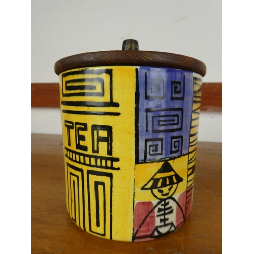 42 - A vintage ceramic Swedish tea caddy with wooden lid.