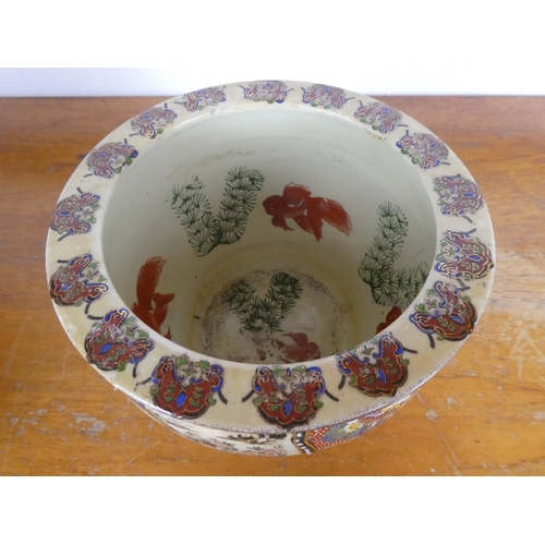 50 - A decorative Oriental/ Chinese style planter, in the form of a fish bowl.