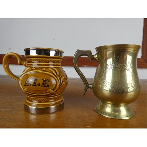56 - A vintage Wade 'Ale' tankard and a silver plated tankard.