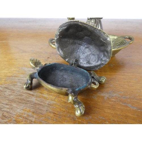 8 - An assortment of brassware to include bells, basket & tortoise.