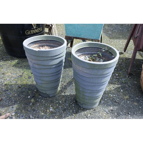 105 - A large pair of planters, measuring 56cm in height.