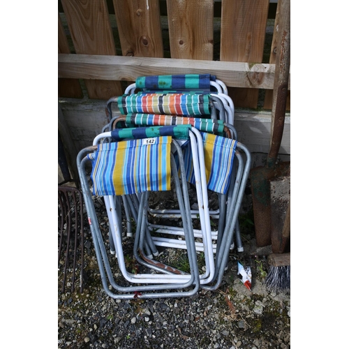 142 - An assortment of vintage camping stools.