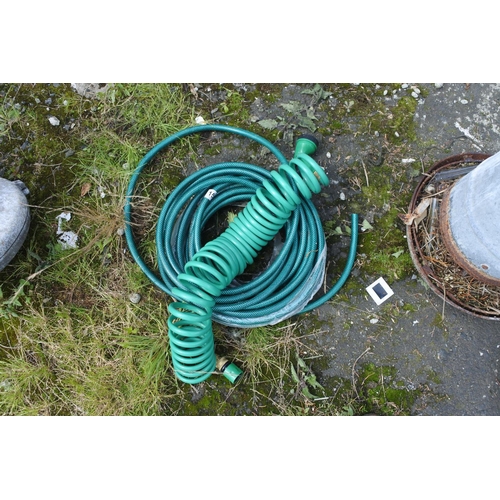 151 - 2 garden hoses.