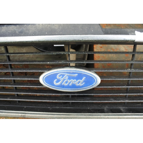 25 - A Ford Car grill.