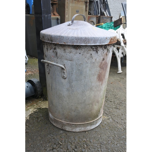 5 - A dustbin with lid.