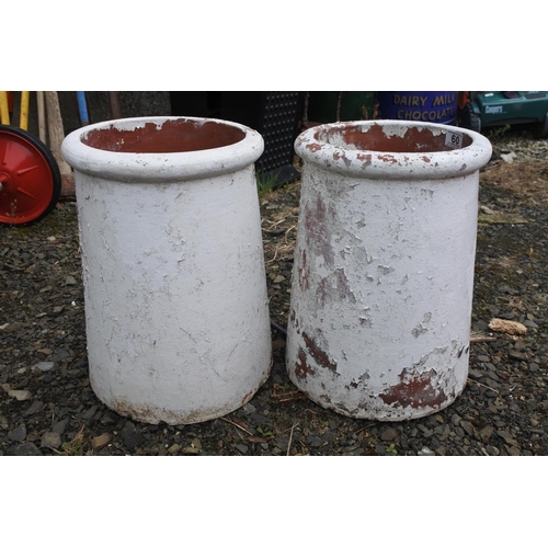 60 - A vintage ceramic pair of chimney pots, 39cm tall.
