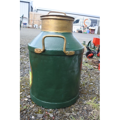 69 - A large hand painted milk can, measuring 70cm in height and 45cm in width.