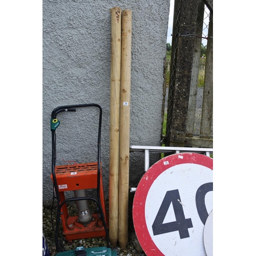 74 - 2 large wooden posts, both measuring 6ft in height.