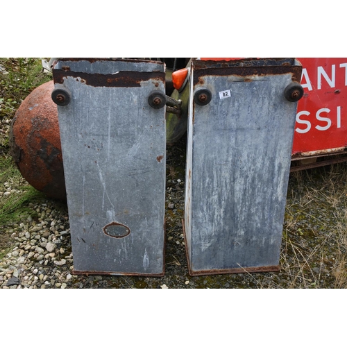 82 - A pair of vintage galvanised feeders.