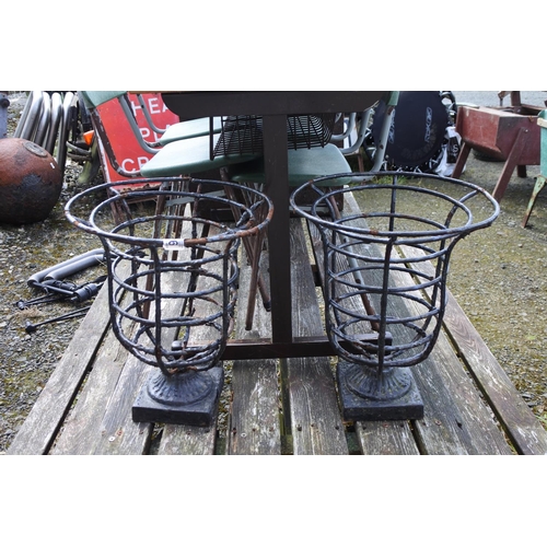 94 - A pair of metal wire urns.