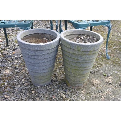 99 - A large pair of planters, measuring 46cm in height.