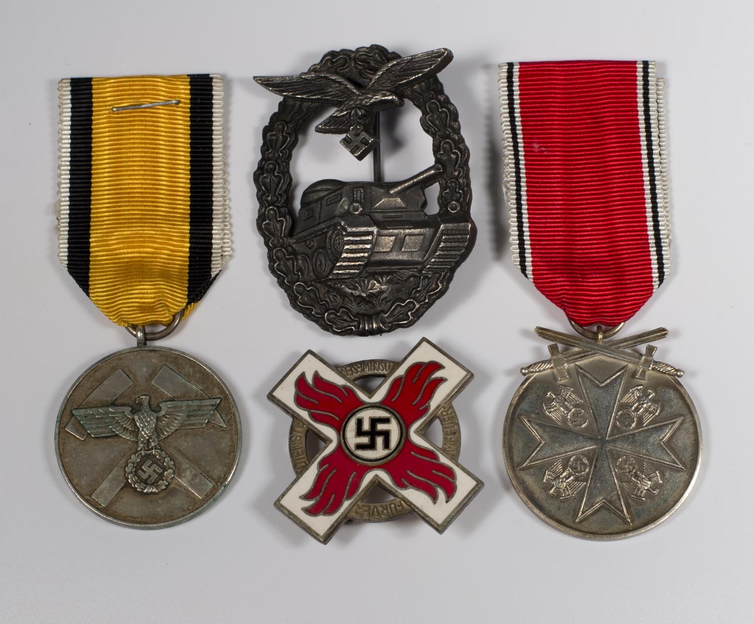 Four Replica German Second World War Medals And Badges   1100033553.JPG