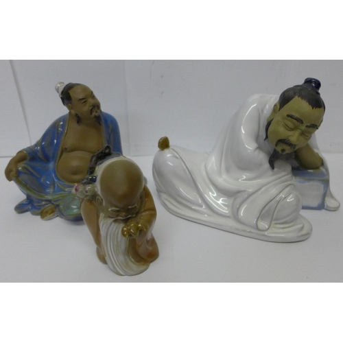 628 - Three figures of oriental gentlemen