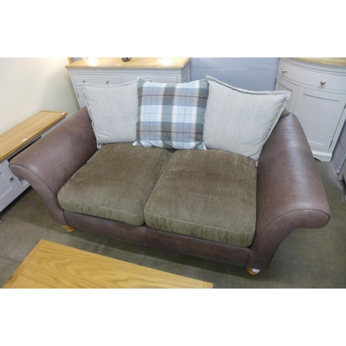 1406 - An Alexander & James two seat designer sofa (some use)