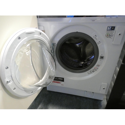 3011 - AEG Integrated Washing Machine (7kg) (H819xW596xD540) - model:- L7FE7461BI, RRP £540.83 inc. VAT * T... 