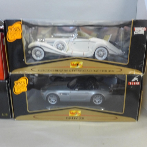 Five 1 18th scale model cars 3x Maisto Solido  and Burago 