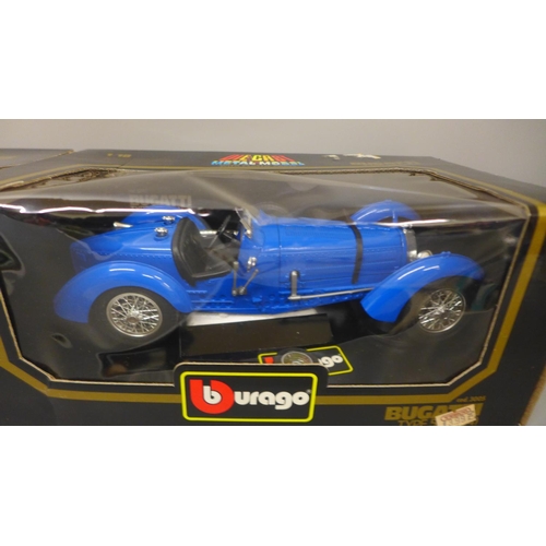 601 - Four 1/18th scale die-cast model vehicles including Burago; Bugatti, Mercedes x2 and Jaguar