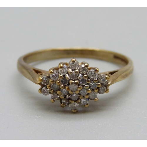 929 - A 9ct gold diamond cluster ring, 2g, N