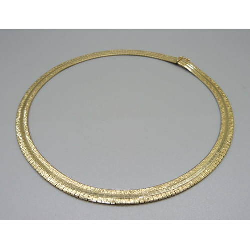 930 - A yellow metal necklace marked 585, 43.9g, 44cm