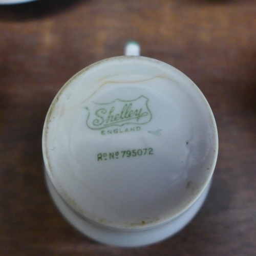 651 - A Shelley Oxford tea set, serial no. C12387 including six cups, twelve saucers, twelve tea plates, t... 
